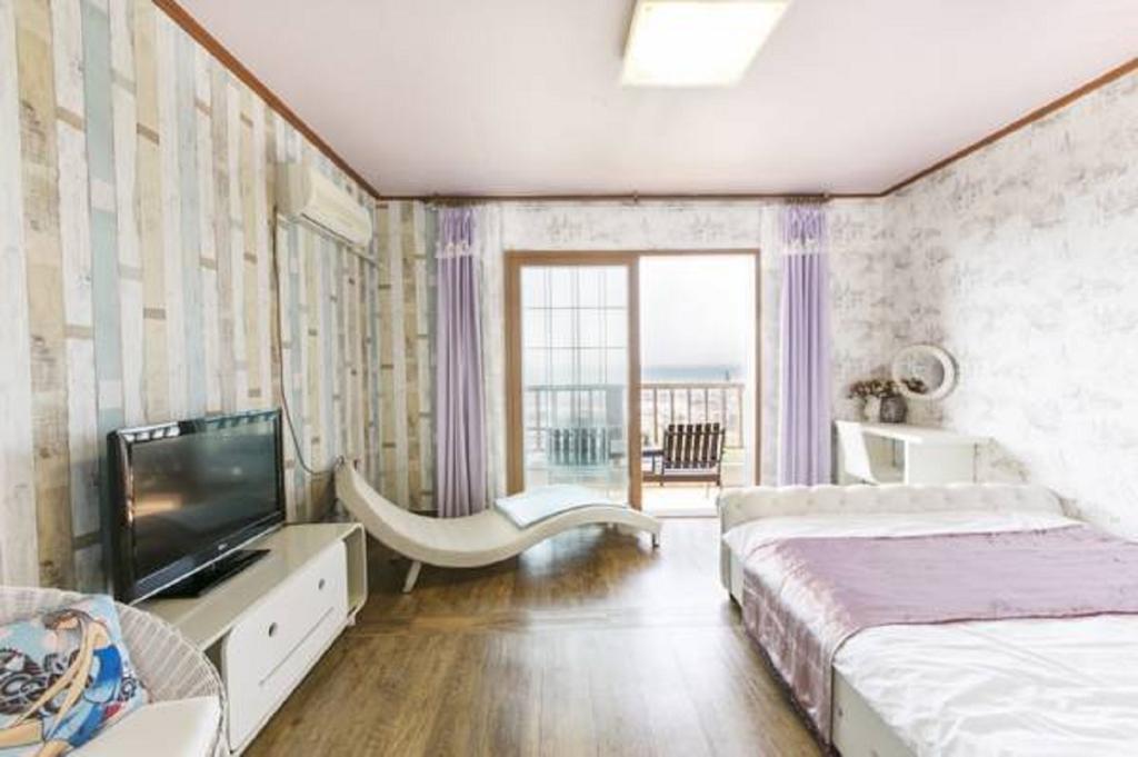 Dg Beach Pension Jeju Quarto foto