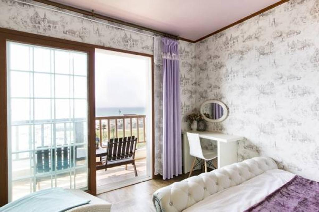 Dg Beach Pension Jeju Quarto foto